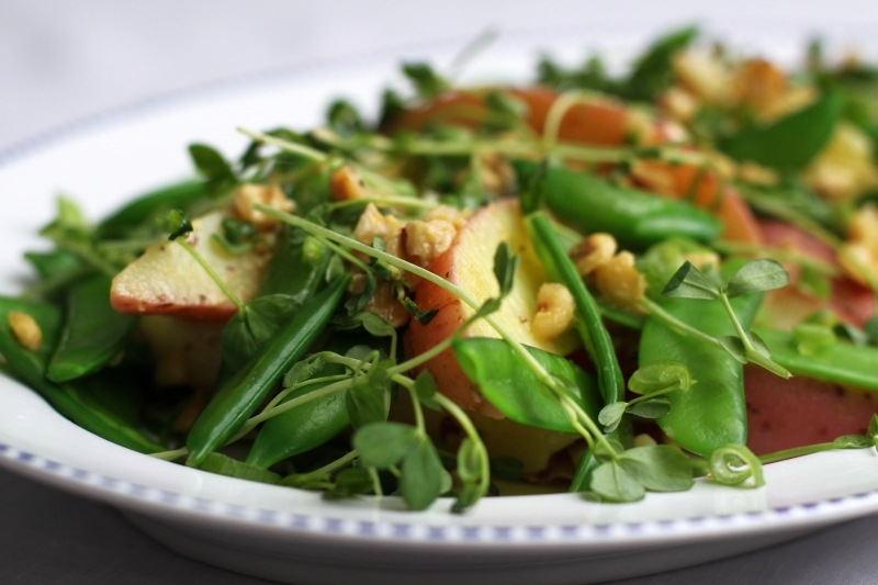 Potato and pea salad with hazelnut dressing
